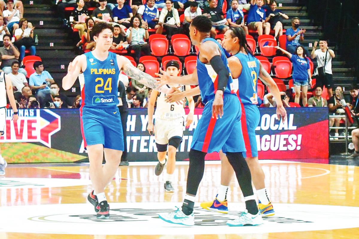 Gilas Pilipinas’ Dwight Ramos, Justin Brownlee and Chris Newsome in their battle against Chinese Taipei in the 2025 FIBA Asia Cup qualifiers in Pasig City on February 25, 2024. (Mark Demayo / ABS-CBN News photo)