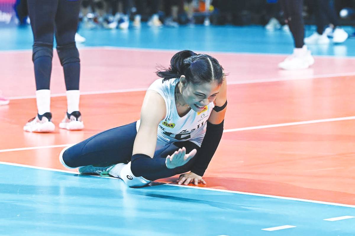 Negrense Angel Canino of the De La Salle University Lady Spikers was on the floor after a failed save of the ball. (UAAP photo)