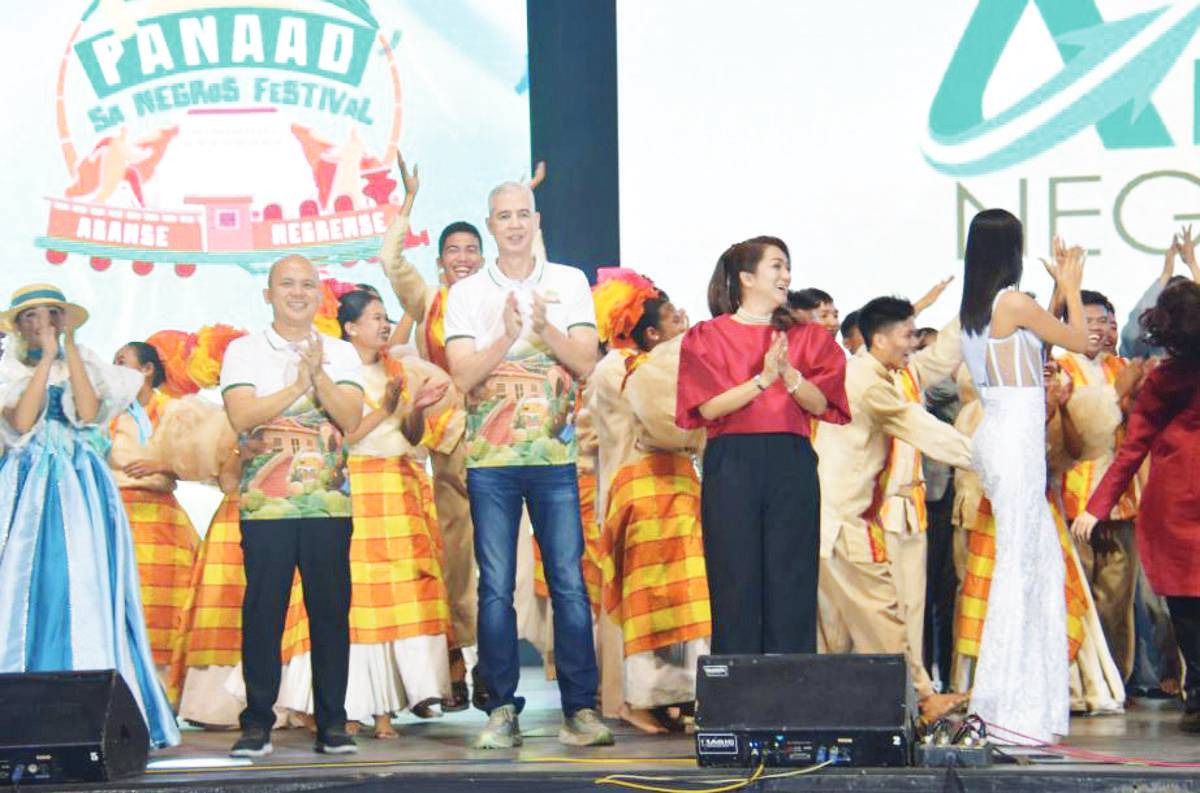 Negros Occidental Governor Eugenio Jose Lacson (second from right) with Provincial Administrator Rayfrando Diaz II (2nd from left) and Provincial Tourism Officer Cheryl Decena (right) during the culmination program of the 28th Panaad Sa Negros Festival at the Panaad Park and Stadium in Bacolod City on Sunday night, April 21, 2024. The sales of local government units and other sellers totaled P19.25 million from April 15 to 21. (Negros Occidental PIO photo)