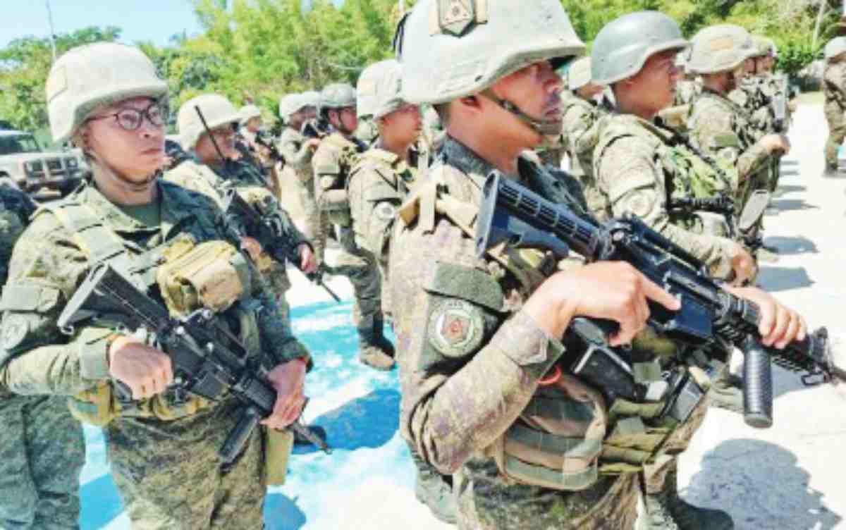 Soldiers of the Philippine Army's 11th Infantry Battalion based in Siaton, Negros Oriental, stand in attention during a formation in this undated photo. The Philippine Army says that it would not withdraw its forces from the province despite its declaration as under a state of Stable Internal Peace and Security. (PNA / File photo)