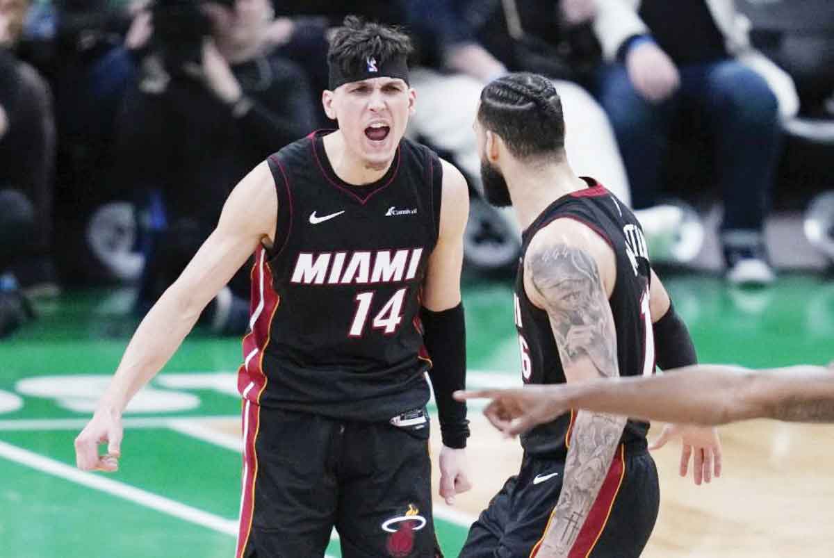 Miami Heat guard Tyler Herro (left) celebrates with Caleb Martin late in the second half of Game 2 of their NBA first-round playoff series against the Boston Celtics. (Charles Krupa / AP photo) 