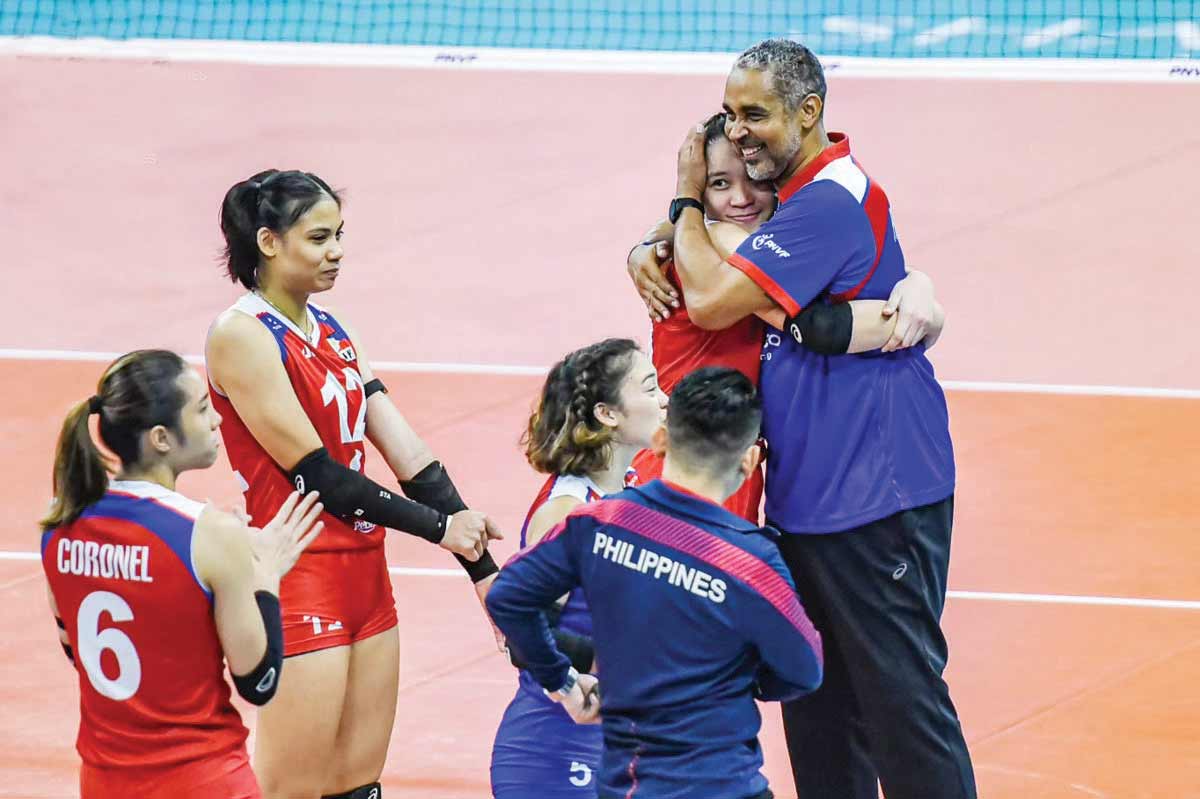 Bacolodnon Arah Panique was hugged by Alas Pilipinas head coach Jorge Edson Souza de Brito following her strong showing in their straight-set defeat to Kazakhstan. (PVL photo)