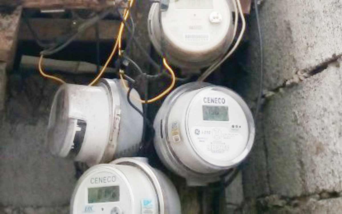 An undated photo of electric meters at a residential area in Bacolod City. Mayor Alfredo Abelardo Benitez urged the Energy Regulatory Commission to act on the joint petition for the approval of the power supply agreement of Central Negros Electric Cooperative and Energy Development Corporation that could lower the cost of power in the city. (PNA Bacolod / File photo)  