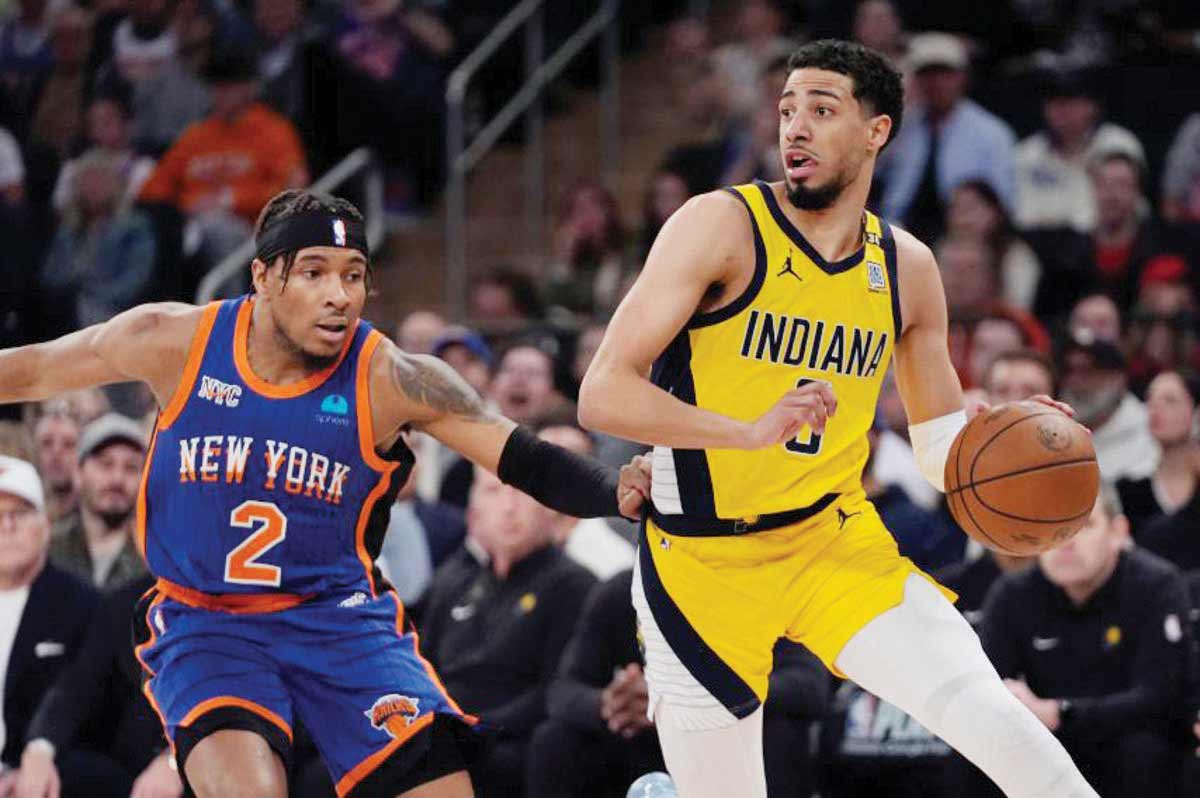 New York Knicks’ Miles McBride (left) defends Indiana Pacers’ Tyrese Haliburton during Game 5 of an NBA second-round playoff series. (Frank Franklin II / AP photo)