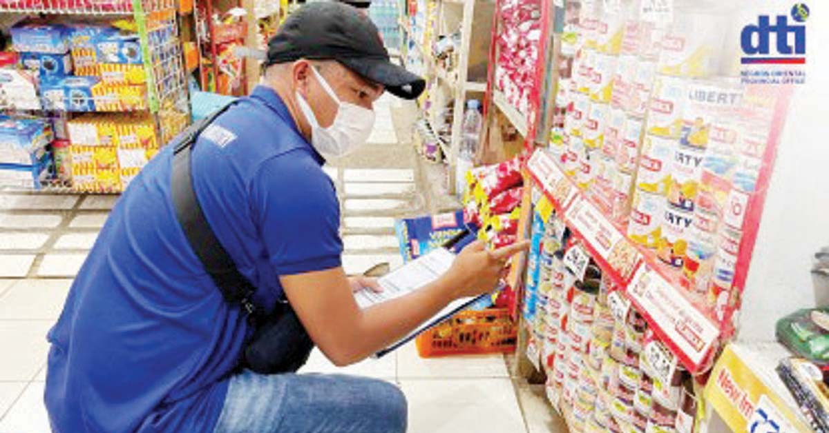 A personnel of the Department of Trade and Industry in Negros Oriental conducts regular price monitoring at a business establishment in this undated photo. A price freeze is being imposed for 60 days in the province after it was declared under a state of calamity due to the El Niño phenomenon. (DTI-Negros Oriental / Facebook photo)