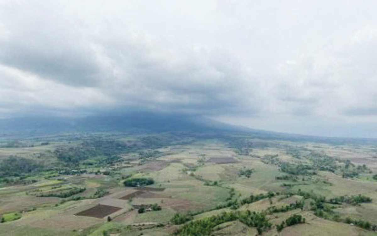 Mt. Kanlaon continues to spew smoke, steam and sulfur dioxide but can hardly be noticed on a cloudy day, like in this June 5, 2024 photo. Damage to agriculture brought by its eruption has reached over P104 million in Regions 6 and 7, the National Disaster Risk Reduction and Management Council bared yesterday, June 13, 2024. (Contributed photo)