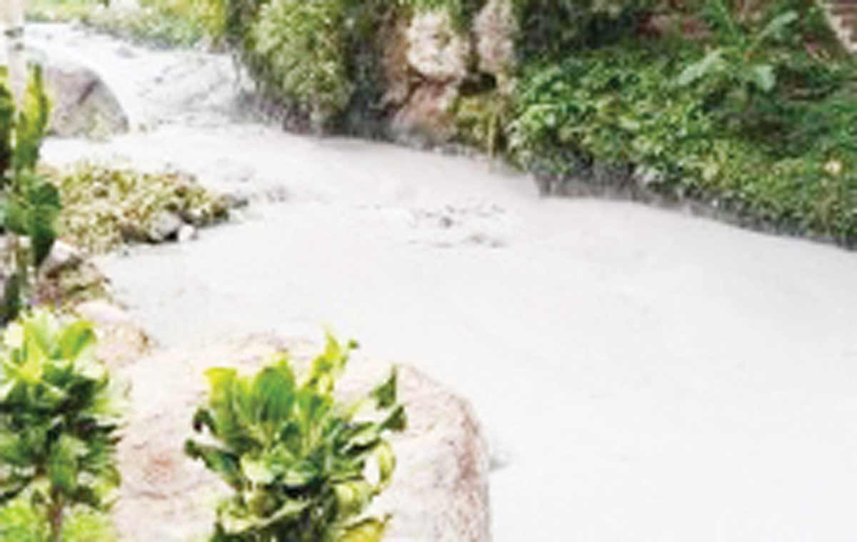 Lahar flow at the Padudusan Falls in Canlaon City, Negros Oriental on Wednesday, June 5, 2024, in the aftermath of Mount Kanlaon's eruption. The disaster has so far affected 451 families or 1,888 individuals in the provinces of Negros Occidental and Negros Oriental, according to the Office of Civil Defense. (Canlaon City Tourism Unit photo)