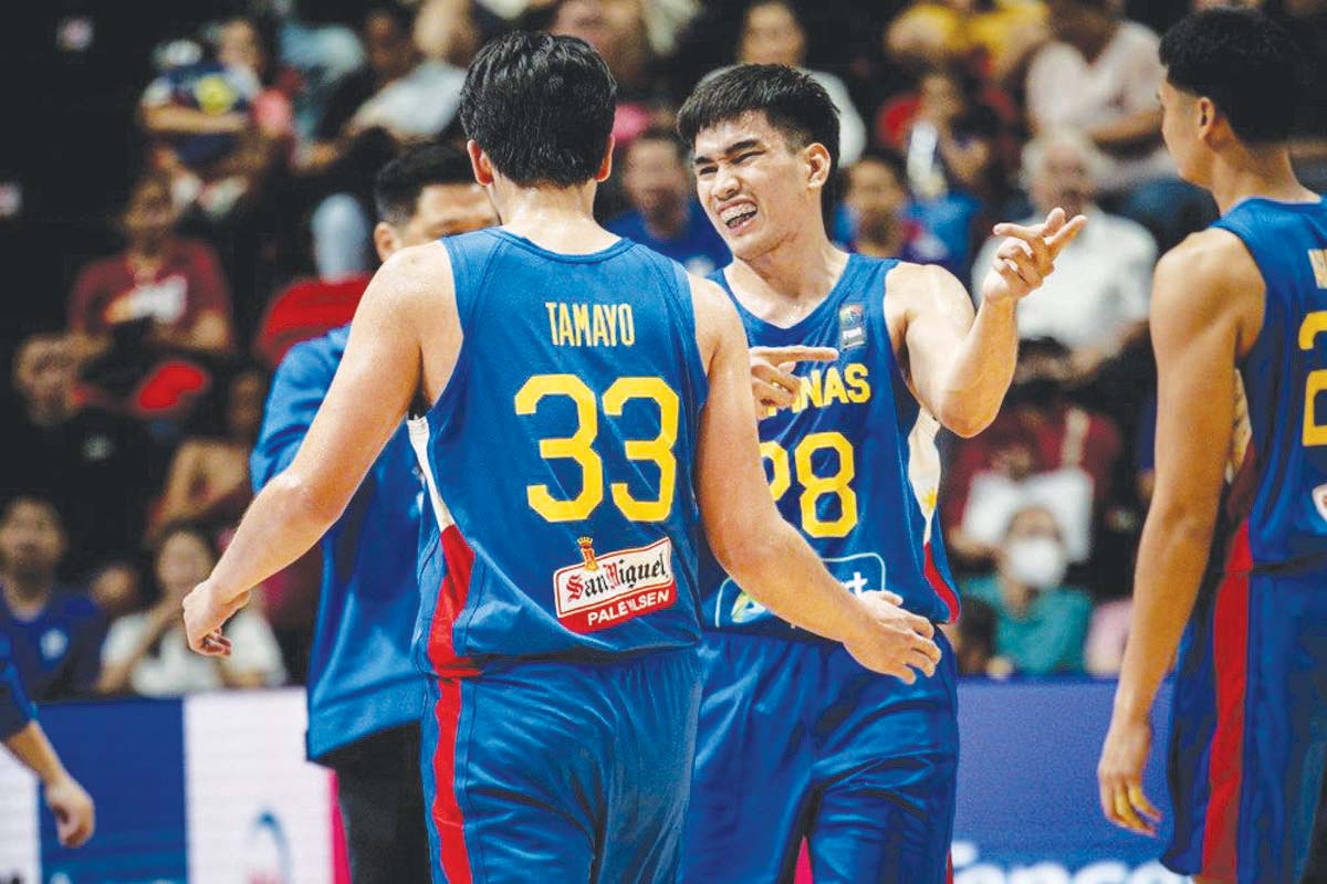 GILAS PILIPINAS’ CARL TAMAYO and KEVIN QUIAMBAO (FIBA photo) 