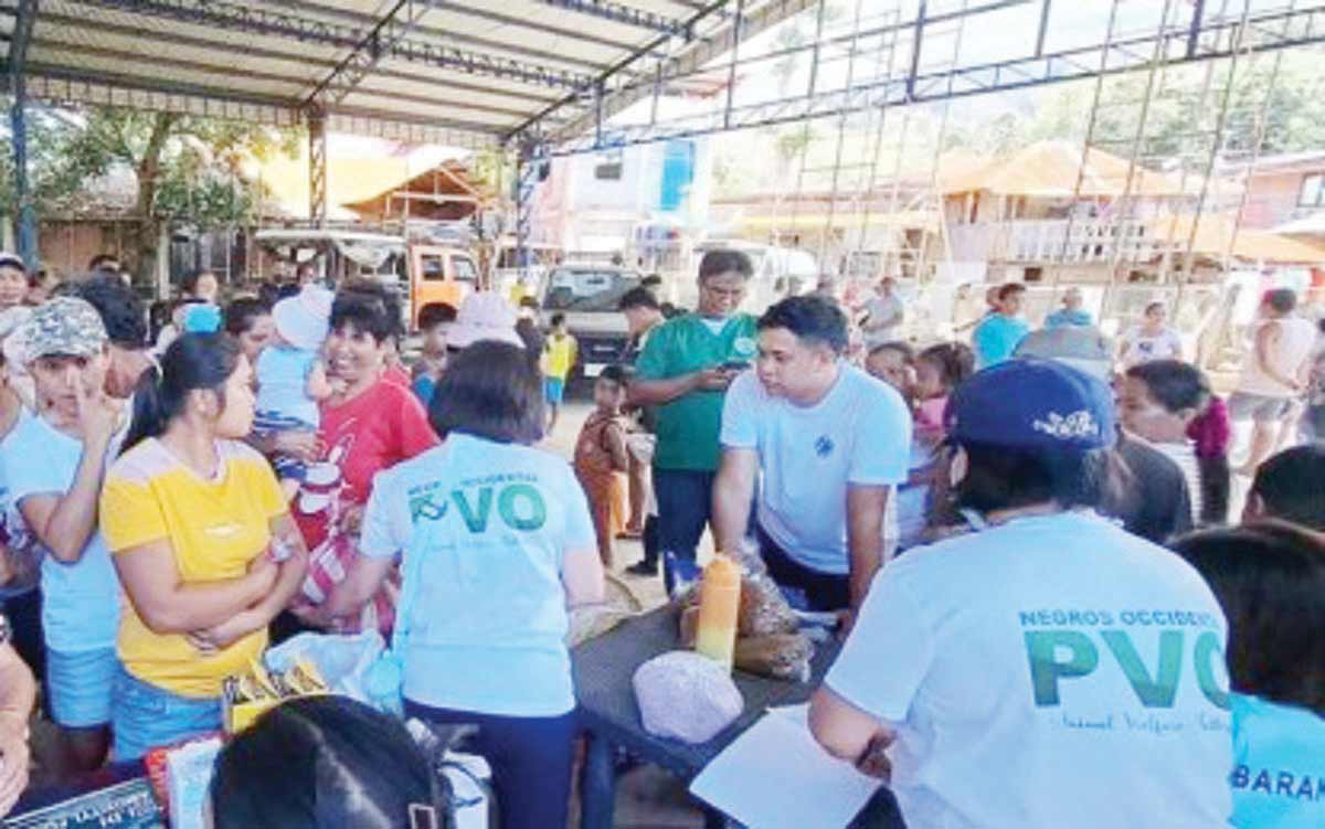 A team from the Provincial Veterinary Office (PVO) of Negros Occidental conducted a medical mission for animals in a village affected by the eruption of Mt. Kanlaon in this photo taken last week. Since June 3, 2024, some 4,764 animal mortalities have been reported; 4,488 are chickens, the latest data from the PVO showed. (Negros Occidental PVO photo)