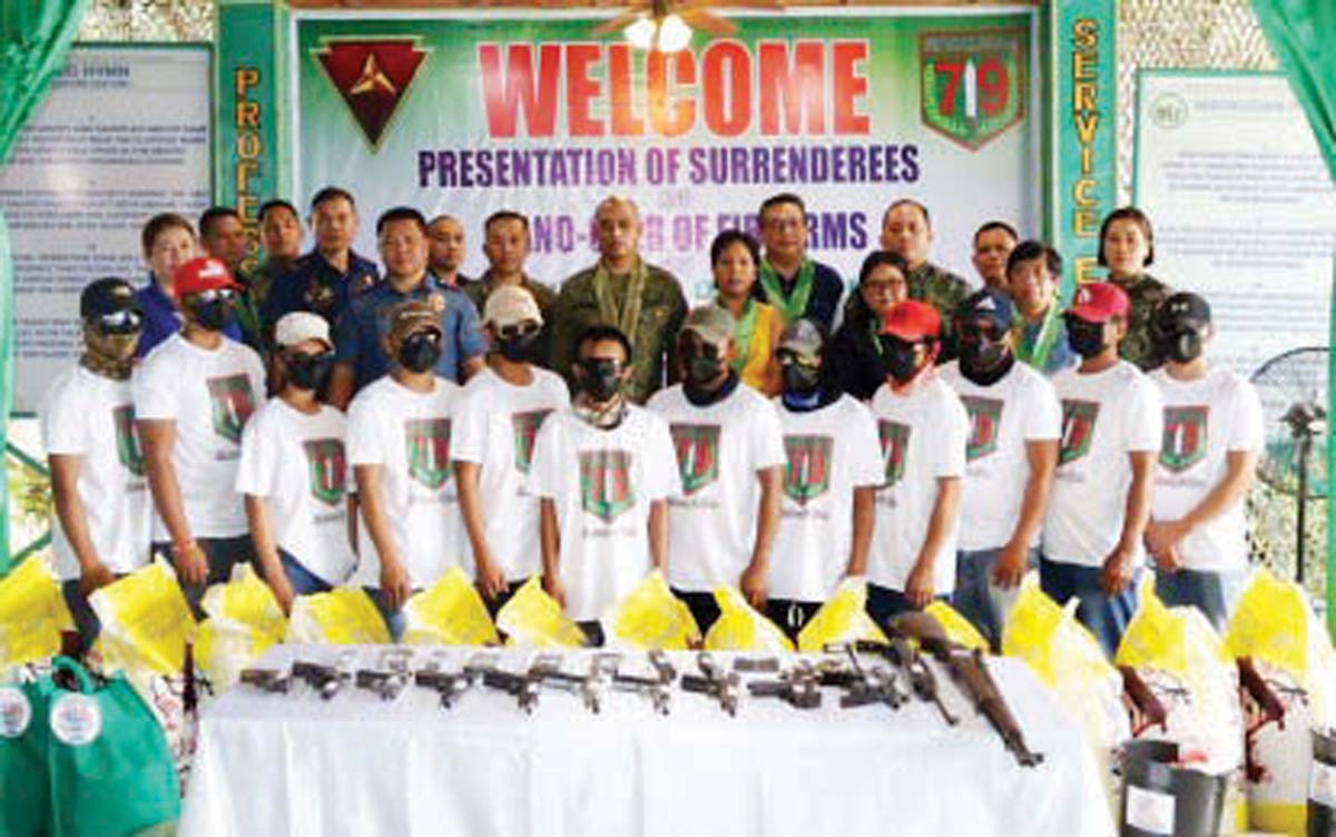 Former Communist Party of the Philippines-New People's Army rebels attend a surrender ceremony with Visayas Command officials on December 30, 2023. An insurgency-free Philippines is possible by the end of 2028 because of convergence among concerned agencies and the non-combat strategies that entice communist fighters to lay down their arms, according to Presidential Peace Adviser Secretary Carlito Galvez, Jr. (Viscom PIO / File photo)