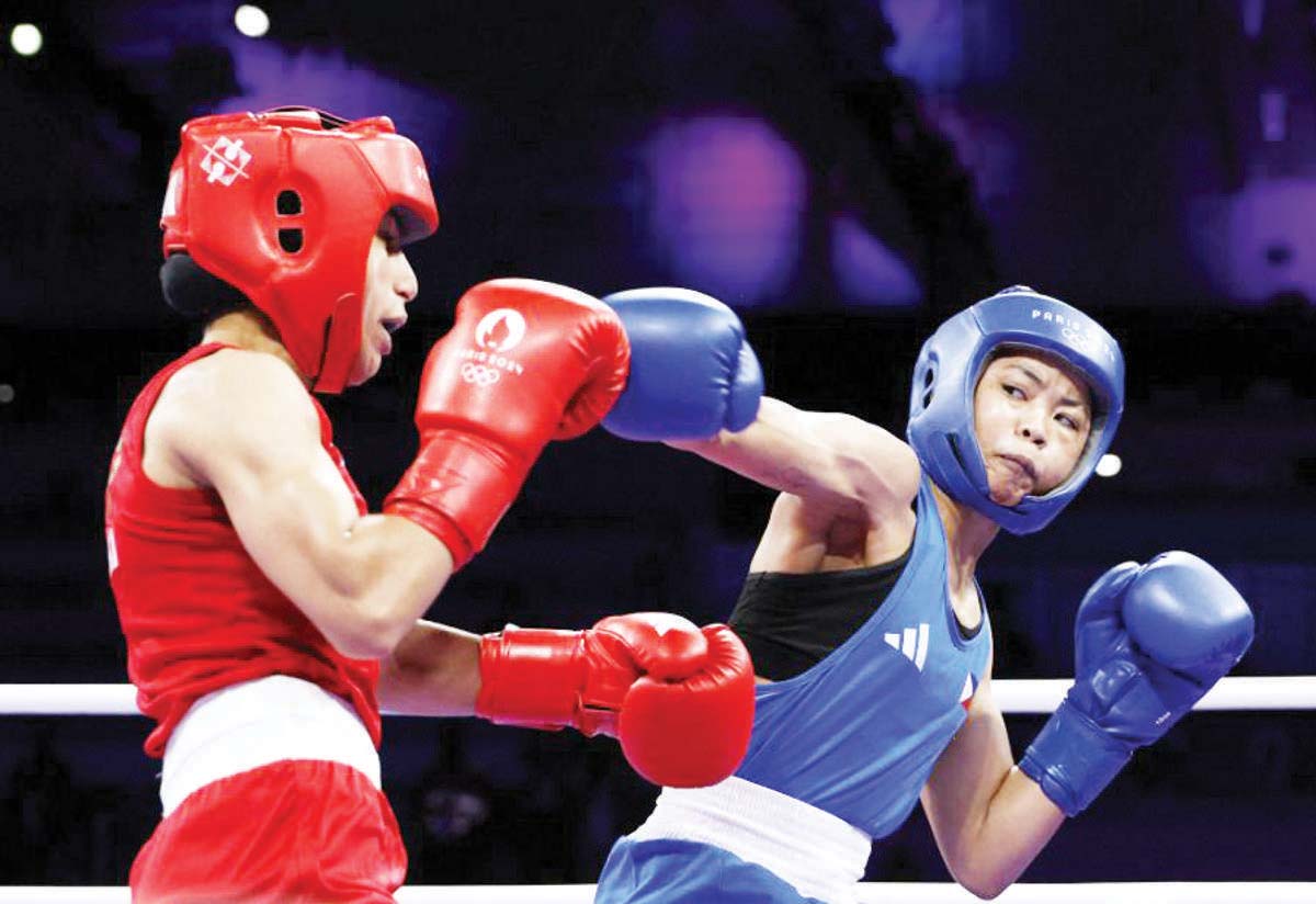 Aira Villegas of the Philippines in action against Yasmine Mouttaki of Morocco. (Peter Cziborra /Cignal TV / One Sports / Reuters photo)