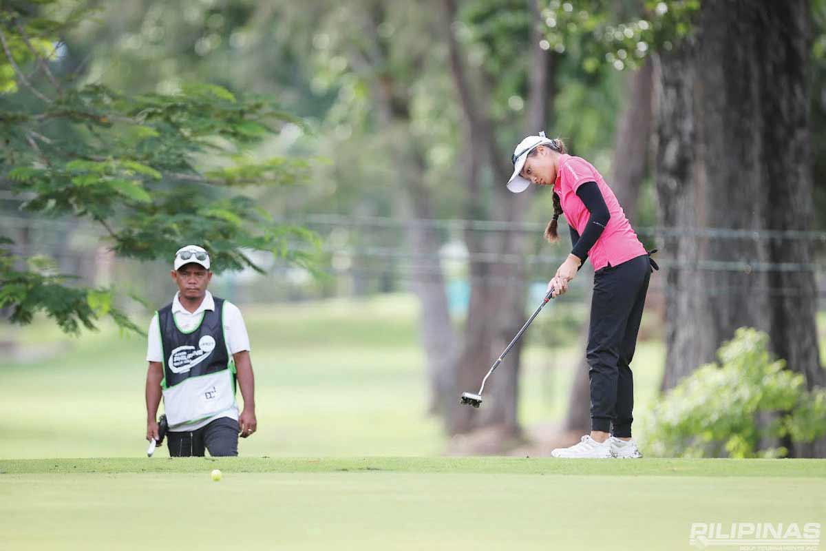 Dominique Gotiong looks on after hitting the ball. (ICTSI photo) 