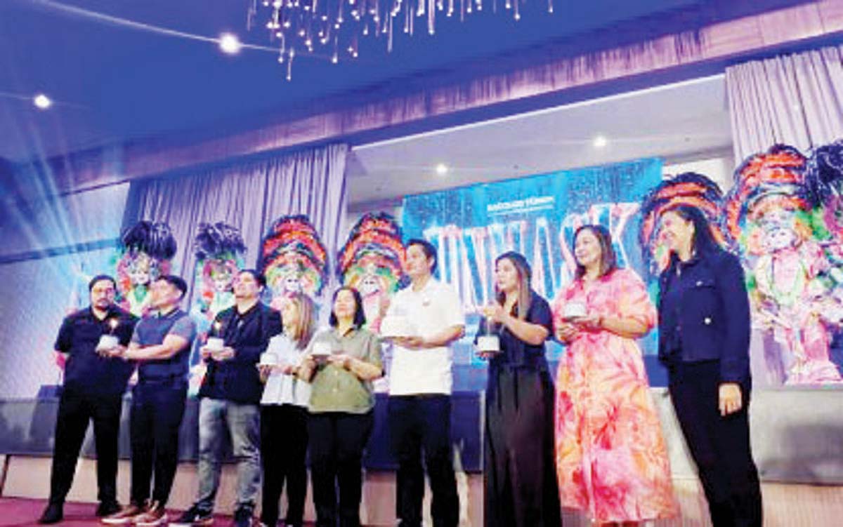 Bacolod City Mayor Alfredo Abelardo Benitez (sixth from left) and Bacolod Yuhum Foundation Inc. president Katherine Matiling (extreme right), with other city officials, lead the launch of the 45th MassKara Festival on Saturday, August 17, 2024. This year's festivity, dubbed the Sapphire Edition, is set from October 11 to 27. (Bacolod City PIO photo)