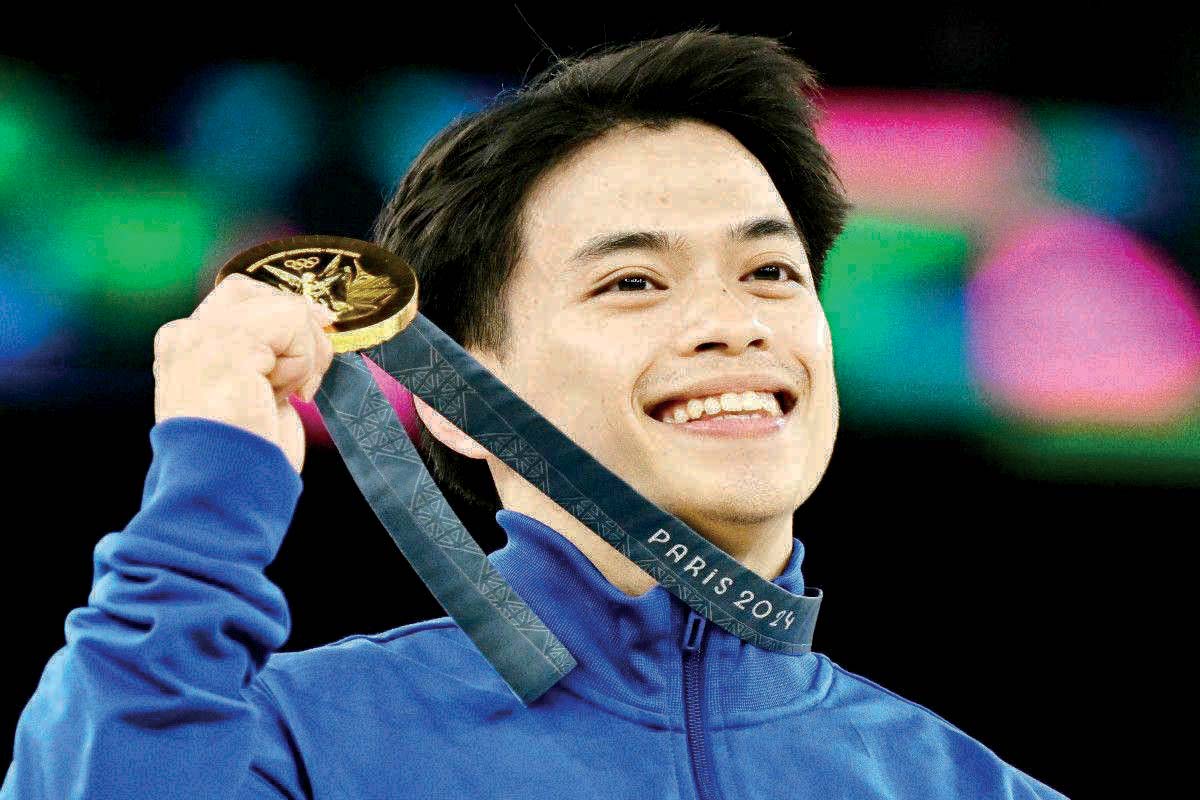 The Philippines' Carlos Edriel Yulo poses with his gold medal during the podium ceremony for the artistic gymnastics men's vault event of the 2024 Paris Olympic Games at the Bercy Arena on Sunday, August 4, 2024. (Lionel Bonaventure / AFP photo)