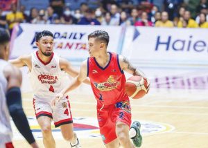 Rain or Shine Elasto Painters rookie Felix Lemetti against Barangay Ginebra San Miguel's RJ Abarrientos. (PBA Images)