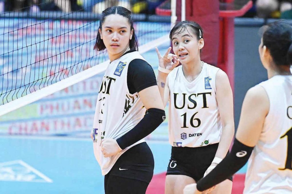 Negrense Cassie Carballo of the University of Santo Tomas Golden Tigresses (16) directs her teammates of their game plan. (V-League photo)