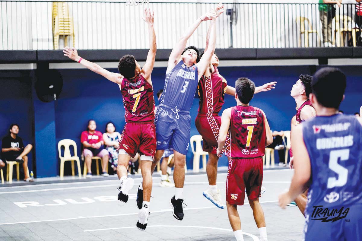 Negros Island Region’s Tobby Orbista was clobbered by the defense of two Cagayan de Oro players. (Chairman’s Cup photo)