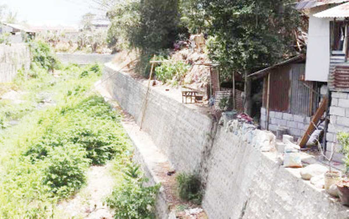 The newly-constructed revetment wall along the Magsungay River will protect around 56,000 residents of Barangays Alijis and Singcang-Airport in Bacolod City against flooding. (DPWH Bacolod City District Engineering Office photo)