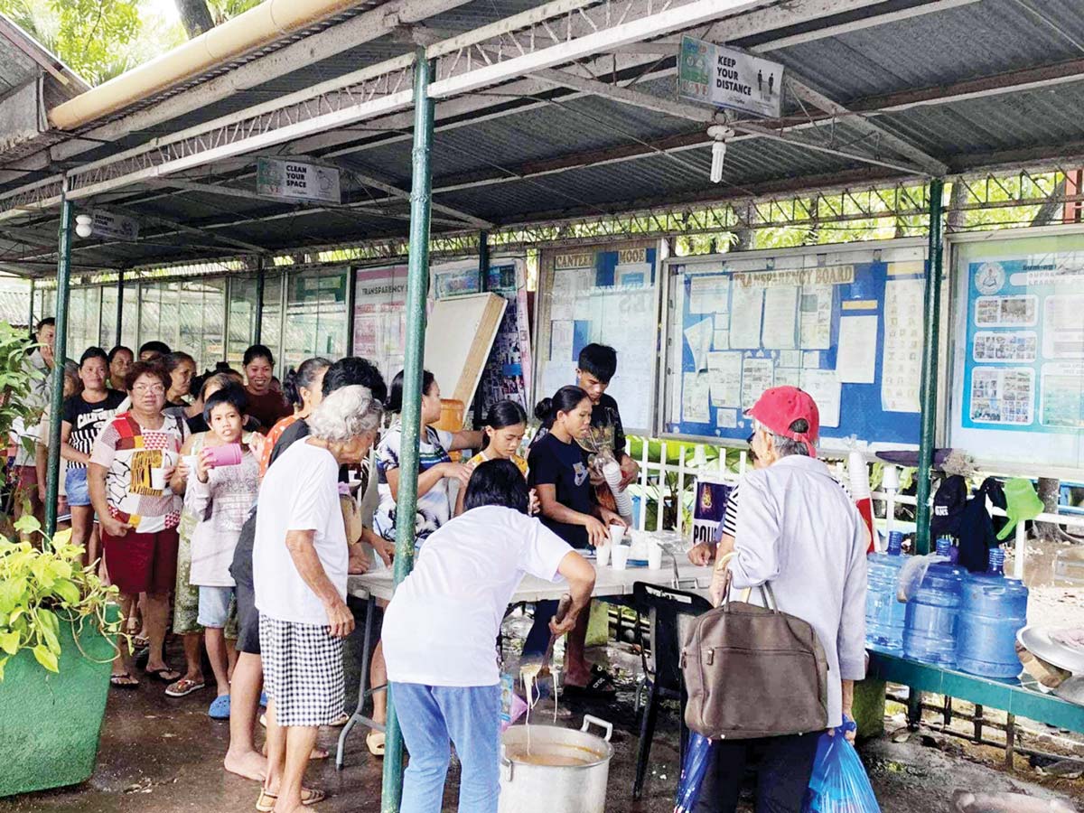 Bacolodnons availed hot meals while inside an evacuation center since Monday, October 21, due to prolonged flooding brought by Tropical Storm “Kristine.” Tropical Cyclone Wind Signal No. 1 was hoisted in 22 local government units in Negros Occidental, including capital Bacolod City, as “Kristine” intensified into a severe tropical storm, the state weather bureau said. (DSSD photo)