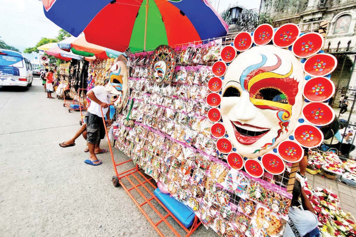 Colorful masks were displayed near the Bacolod Public Plaza yesterday, October 8, 2024, as the 45th MassKara Festival will kick off this Friday, October 11. (Andrew Altarejos photo)