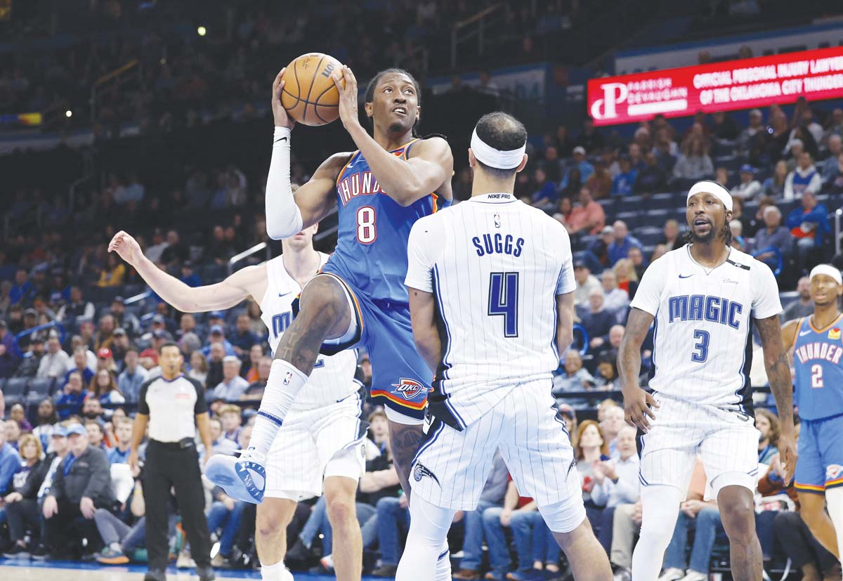 Oklahoma City Thunder forward Jalen Williams drives to the basket against Orlando Magic guard Jalen Suggs. (Alonzo Adams-Imagn Images / Reuters photo)