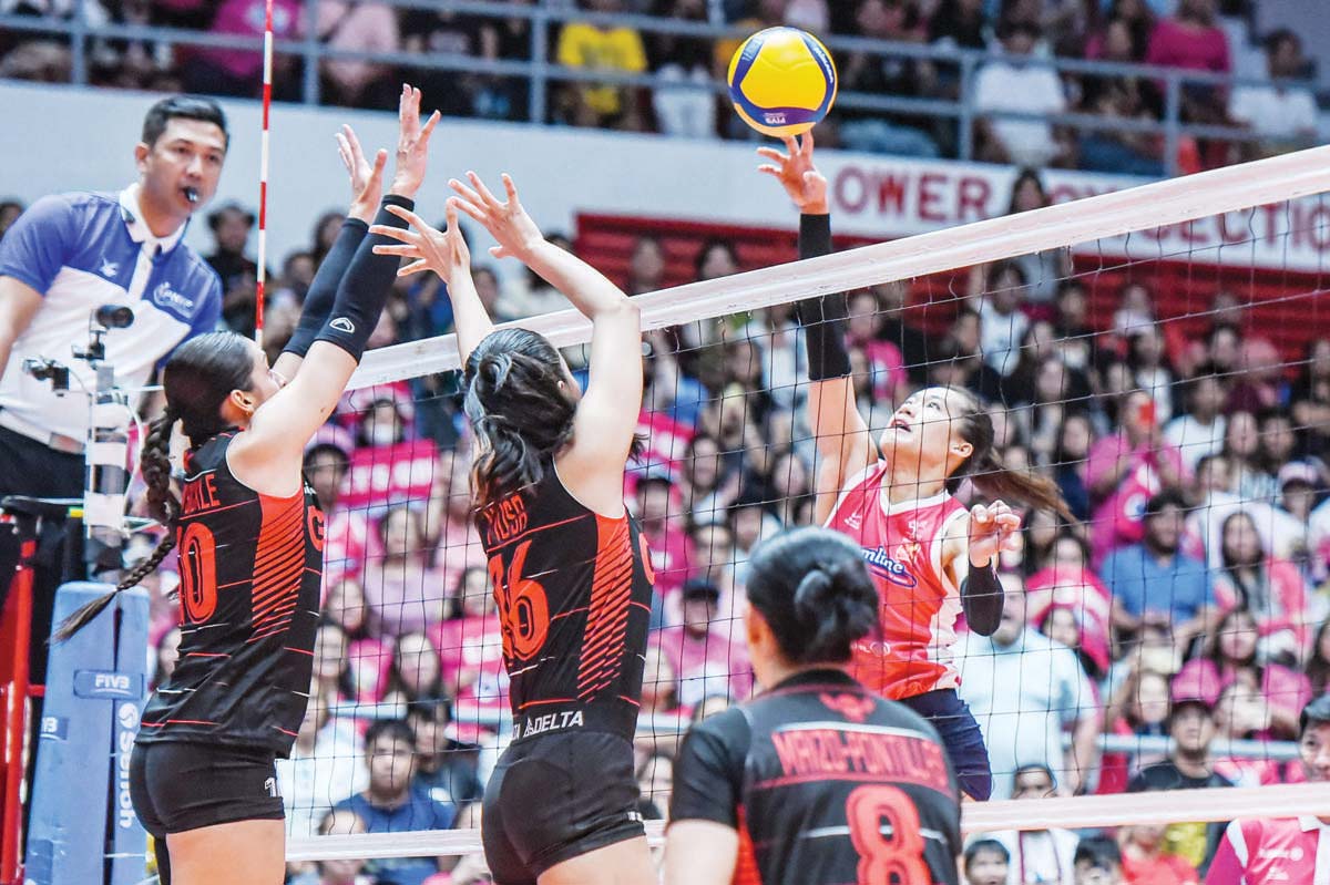 Negrense Bernadeth Pons of the Creamline Cool Smashers goes for a dropball against the defense of Petro Gazz Angels’ Ranya Musa. (PVL photo)