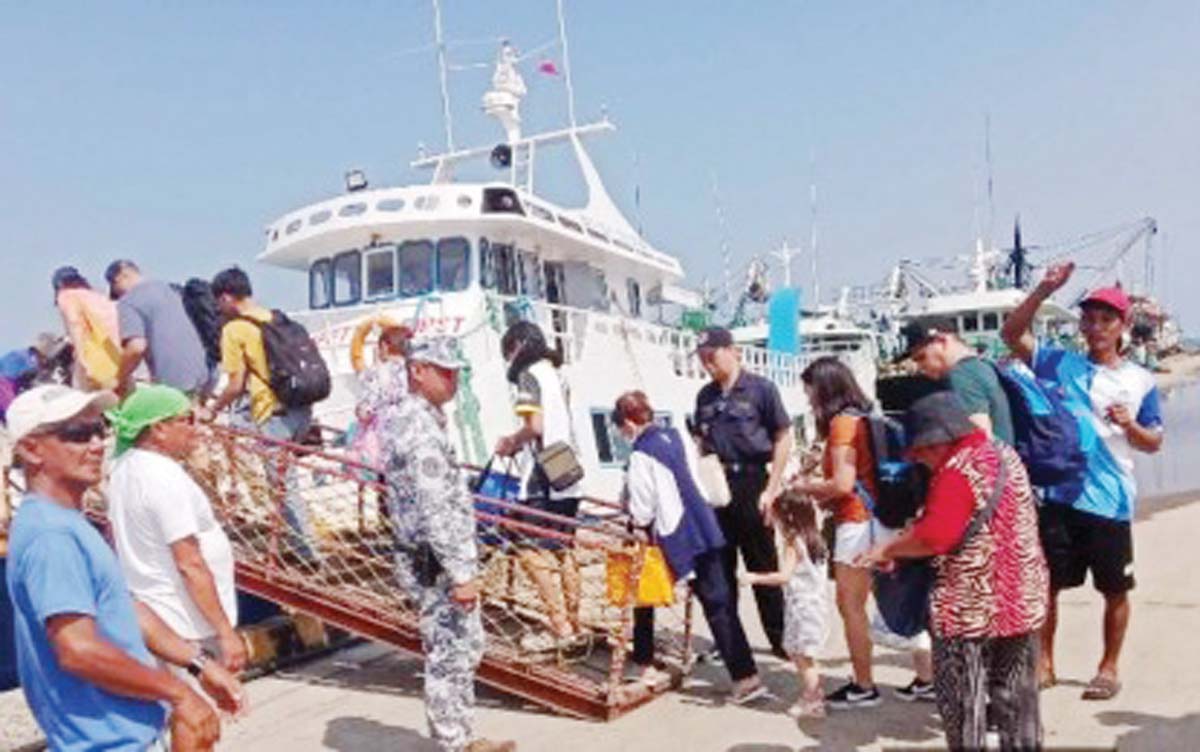 Passengers in Cadiz City, Negros Occidental board a vessel bound for Bantayan Island, Cebu. The Philippine Coast Guard reported there are no more stranded passengers, cargoes, vessels, and motor bancas nationwide after Super Typhoon “Pepito” passed through the country on Sunday, November 17, 2024. (Coast Guard Station Northern Negros Occidental photo)