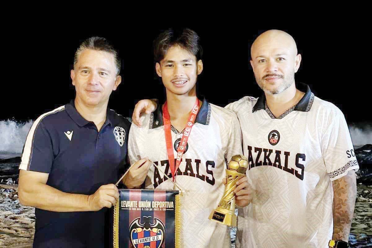 Coach Daniel Pastor, head of the International Training Area for Levante UD, with Joshua Gabriel Moleje, a talented young Azkals Development Academy U-15 footballer from Bacolod City, and ADA founder, former Azkals team captain Stephan Schröck. (Contributed photo)