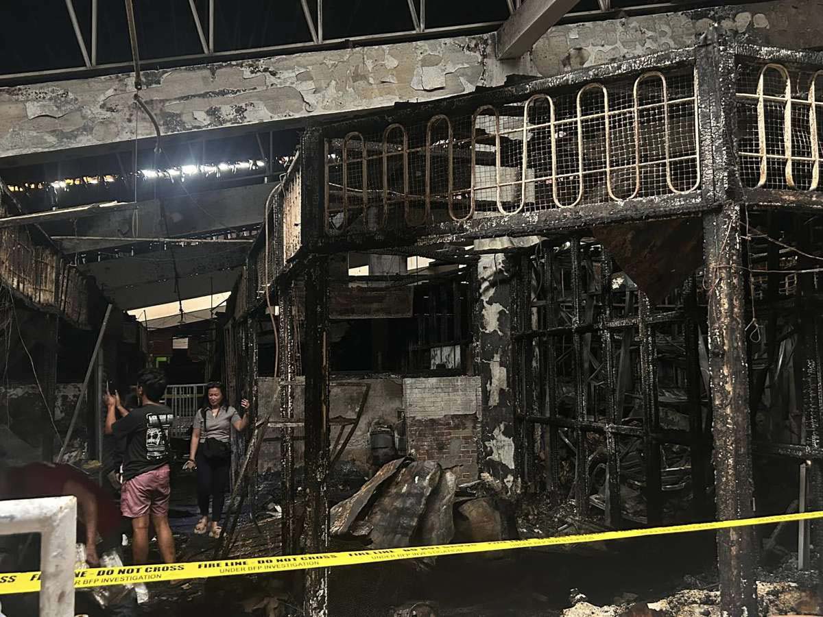 An early morning fire at the Bacolod Central Public Market yesterday, December 13, 2024, left an estimated P4.75 million in damages, the Bureau of Fire Protection-Bacolod said. Story on page 2. (Aksyon Radyo Bacolod photo)