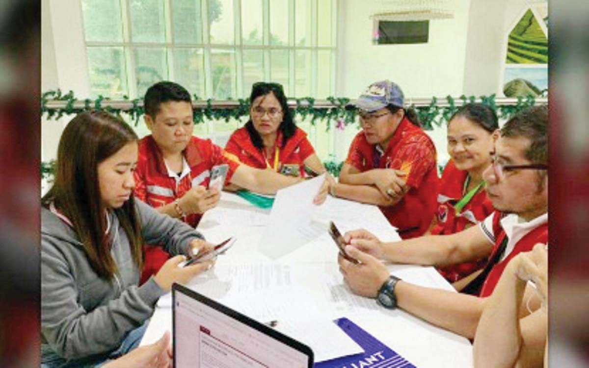 Camp managers at Canlaon City, Negros Oriental evacuation centers meet for updates in this undated photo. The Department of Social Welfare and Development will train additional camp managers on January 8 and 9, 2025 to assist exhausted staff. (Canlaon City PIO photo)