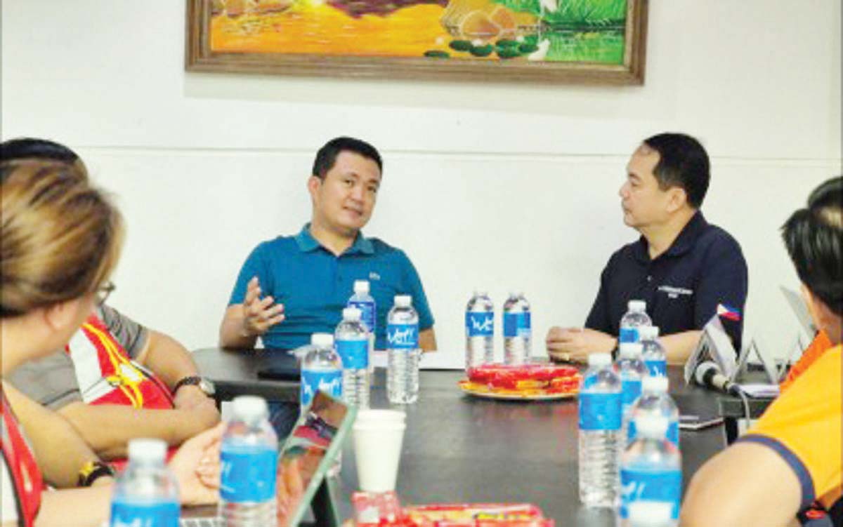 Canlaon City Mayor Jose Chubasco Cardenas discusses "Oplan Exodus" with Office of Civil Defense Undersecretary Ariel Nepomuceno. Cardenas announced a "cash-for-work" program for residents displaced by the December 9 eruption of Mount Kanlaon. (SALTA Canlaon Official photo)