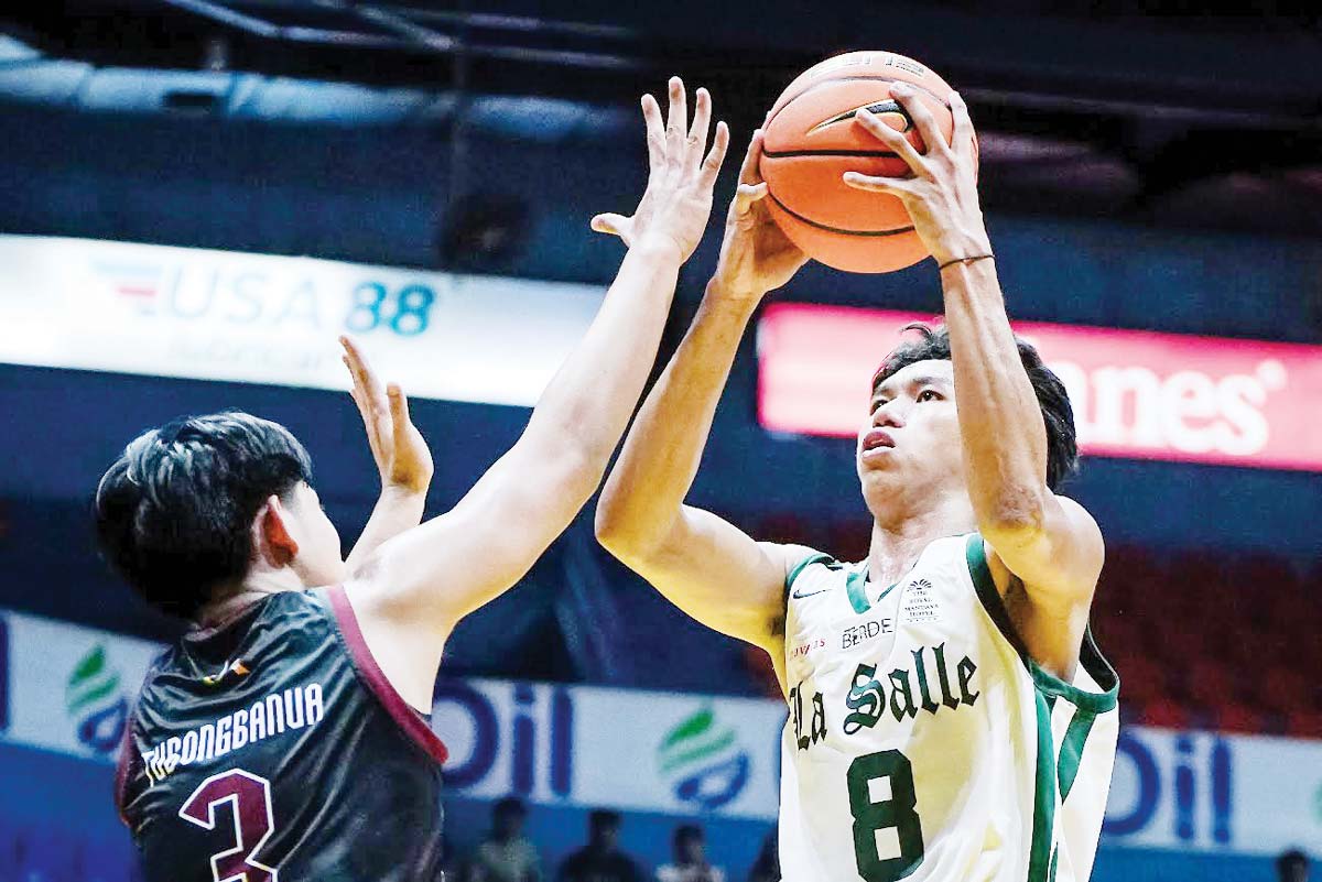 Negrense Bonn Daja of the De La Salle Zobel Junior Archers pulls up for a basket. (UAAP photo)