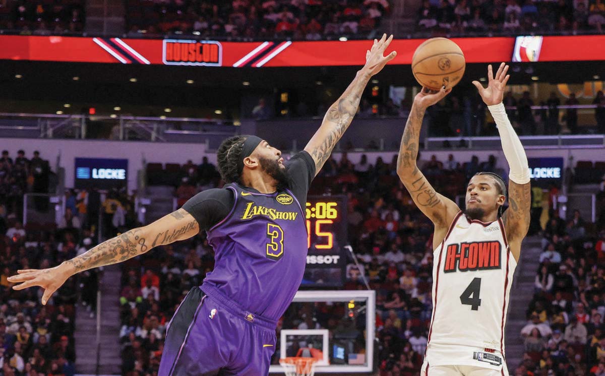 Houston Rockets guard Jalen Green (right) shoots against Los Angeles Lakers forward Anthony Davis. (Thomas Shea-Imagn Images)