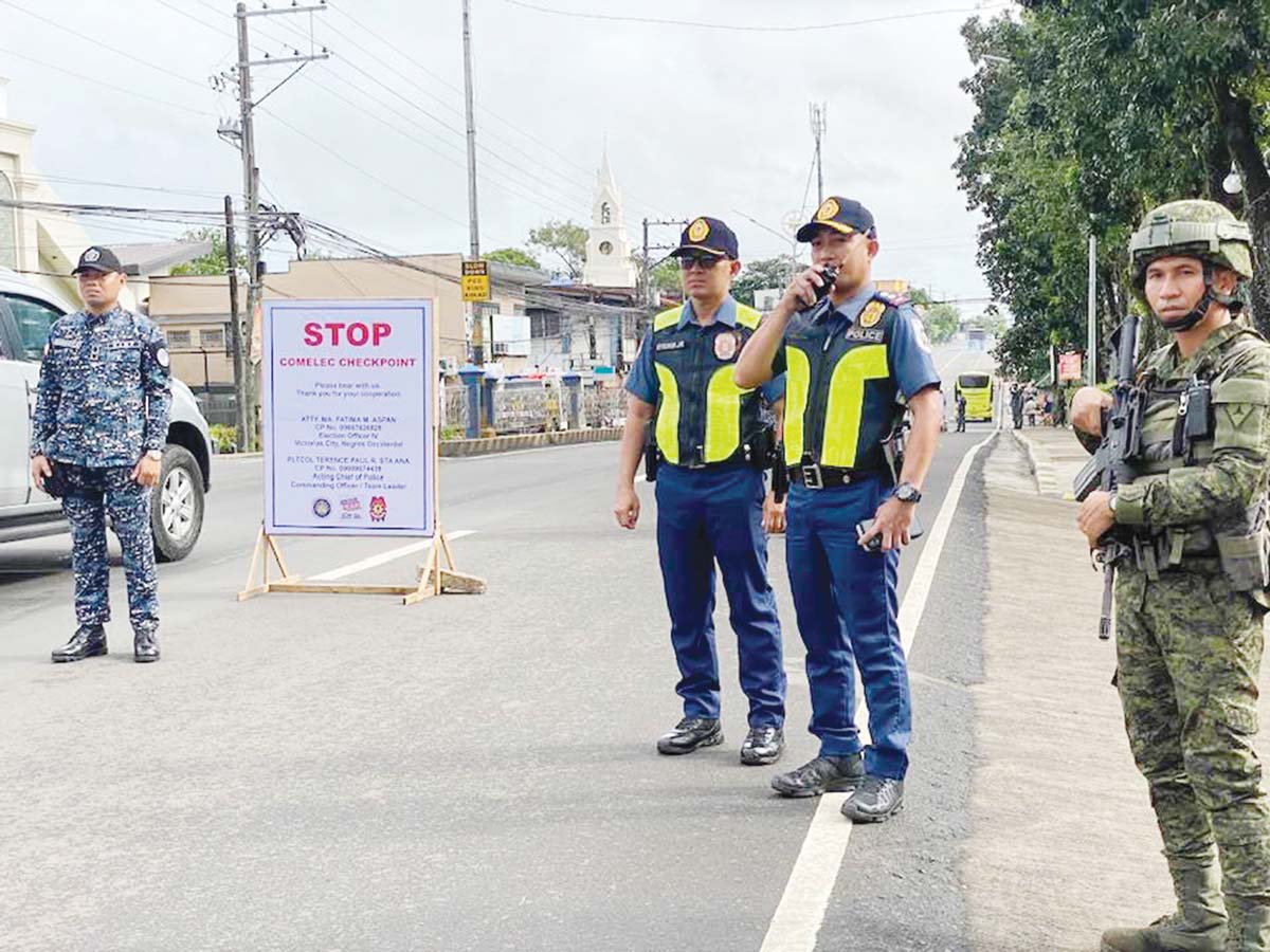 Police personnel set up checkpoints in Negros Occidental’s Victorias City to monitor the movement of vehicles as the election period for the midterm polls began yesterday, January 12, 2025. The checkpoints serve as a deterrent against election-related violence and crimes, ensuring that the election is conducted in a safe and orderly manner. (Victorias City Police Station photo)