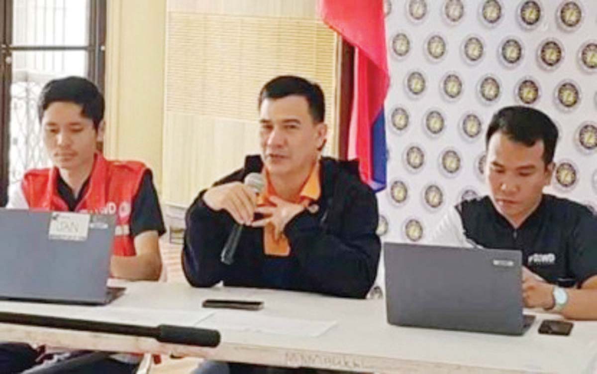 Office of Civil Defense-Western Visayas Regional Director Raul Fernandez (center), with social welfare officer Jan Kristofer Fetalsana (left) and project development officer David Patilla, Jr. of the Department of Social Welfare and Development-Western Visayas, discusses updates on the government's response to the eruption of Mt. Kanlaon at a media briefing held at the Negros Occidental Provincial Capitol in Bacolod City on Wednesday, January 8, 2025. The safety of the displaced Negrenses, with the aim of zero casualty, remains the priority, Fernandez said. (PIA Negros Occidental Facebook / screenshot)