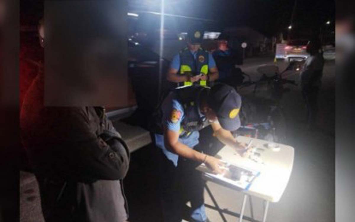 Police and military personnel manning a checkpoint in Bais City, Negros Oriental apprehended a man after he was found in possession of a firearm and ammunition on Monday evening, February 10, 2025. A total of five people have already been arrested in the province relative to the Comelec gun ban since the start of the election period on January 12. (Negros Oriental Police Provincial Office photo)