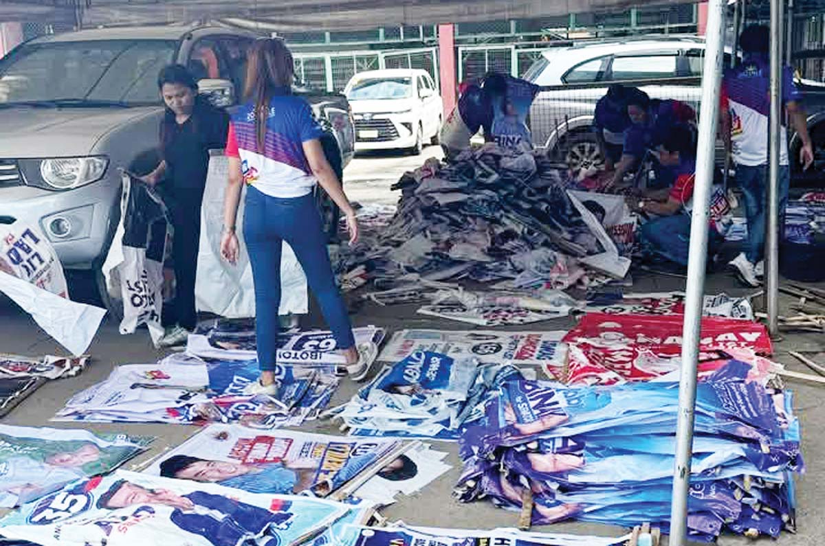 More than 800 illegal campaign materials were taken down during the conduct of Oplan Baklas in Bacolod City on Friday, February 21, 2025. Violation notices have been sent to senatorial candidates and party-list groups to remove their illegal and oversized posters in compliance with the Fair Election Act. (Revo Sorbito photo)