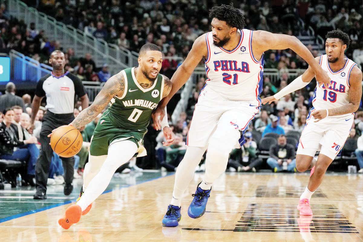 Lillard, Bucks use 3-point barrage to beat 76ers