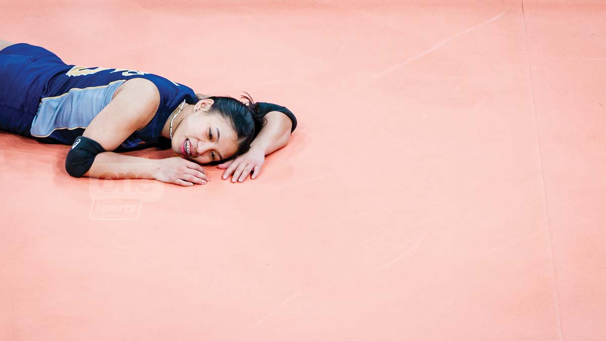 Negrense Shaira Jardio of the National University Lady Falcons lies on the floor after their grueling five-set encounter with the Far Eastern University Lady Tamaraws. (One Sports photo)  