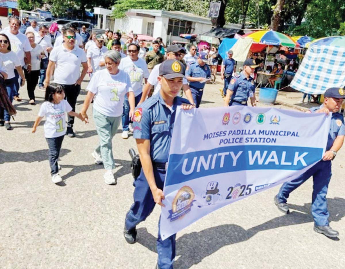 Local candidates for the May 12 elections in Moises Padilla, Negros Occidental joined the unity walk initiated by the Philippine National Police at the municipal auditorium on Sunday, February 9, 2025. The candidates pledged to engage in fair campaigning by focusing on platforms and avoiding personal attacks. (Contributed photo)