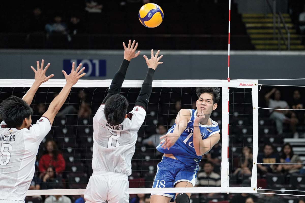 Negrense Jian Matthew Salarzon of the Ateneo de Manila University Blue Eagles smashes the ball towards the defense of the University of the Philippines Fighting Maroons. (UAAP photo)