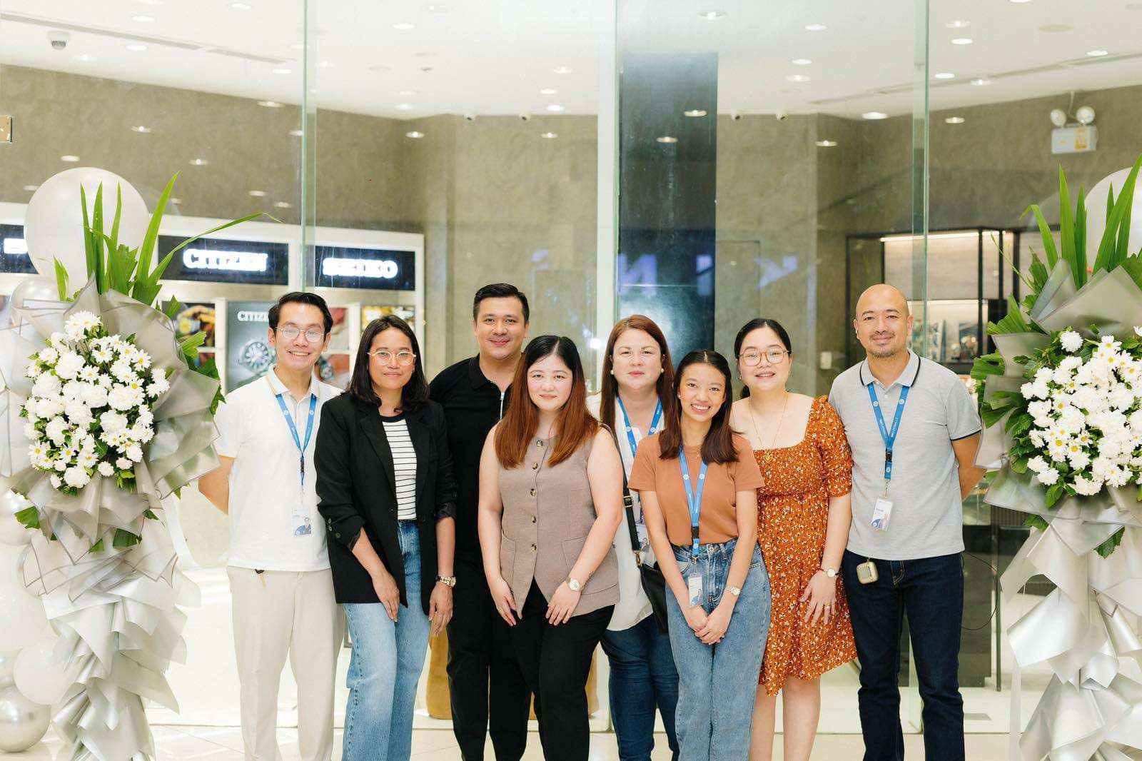 From left to right: A member of the SM Bacolod Marketing Team, Faye Balbalosa (Accounting Head, Wizer Industries, Inc.), Stephen Bacaltos (Operations Head - VisMin, Wizer Industries, Inc.), Natasha Chua (General Manager, Wizer Industries, Inc.), Dominique Marie Schulz (Senior Leasing Manager, SM Bacolod), two members of the SM Bacolod Marketing Team, and Darrell Sy (Assistant Mall Manager, SM Bacolod) during the grand opening of The Watch Store at SM City Bacolod.