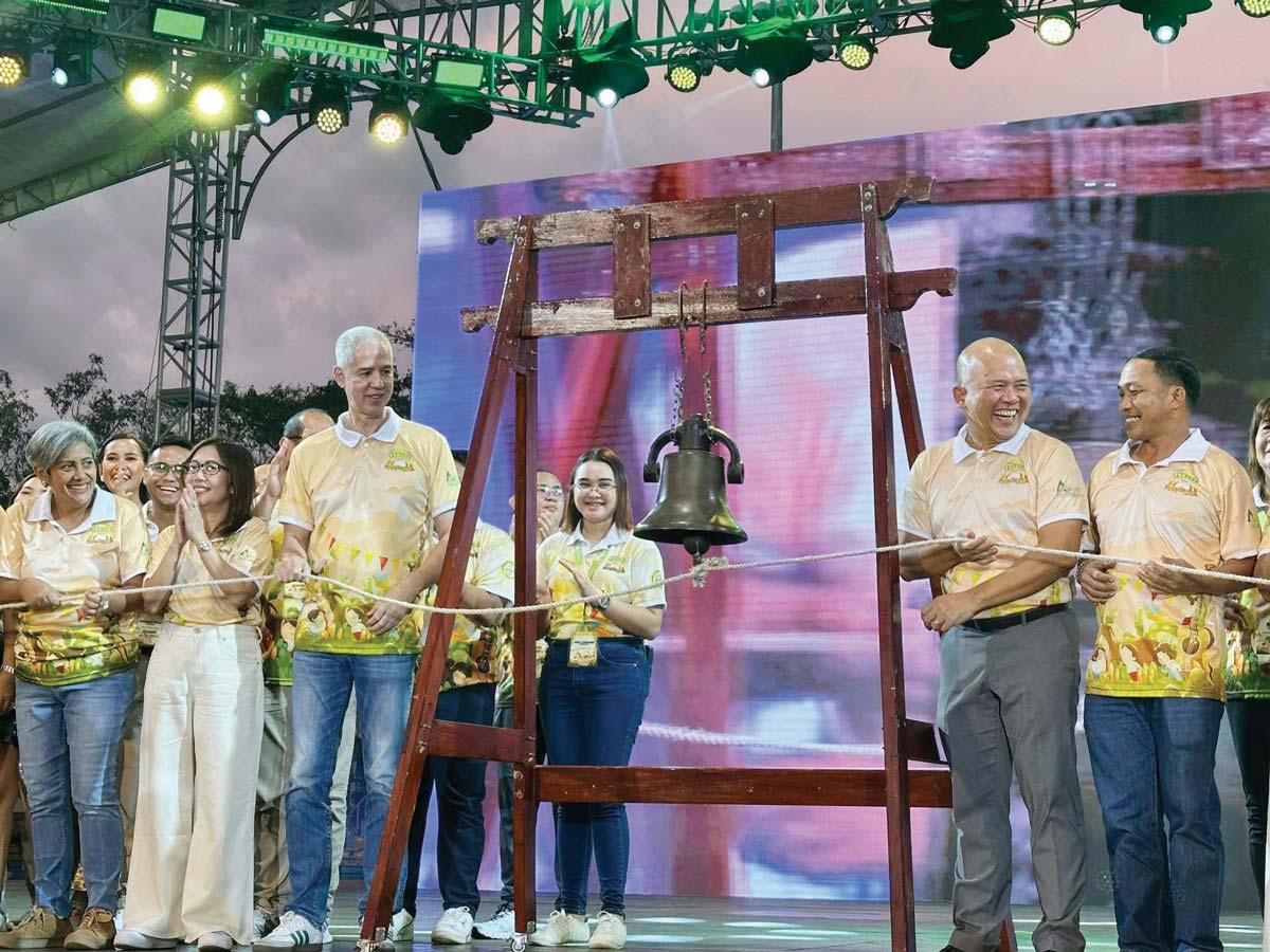 Negros Occidental Governor Eugenio Jose Lacson (third from left) leads the "arima" or ringing of the bell to signal the official start of the 29th Panaad sa Negros Festival at Panaad Park and Stadium in Bacolod City yesterday, March 24, 2025. Negrenses and visitors will be treated to festive music, dance, artistry, beauty, and delicious local delicacies from the 32 local government units until March 30. (dyHB RMN Bacolod photo)