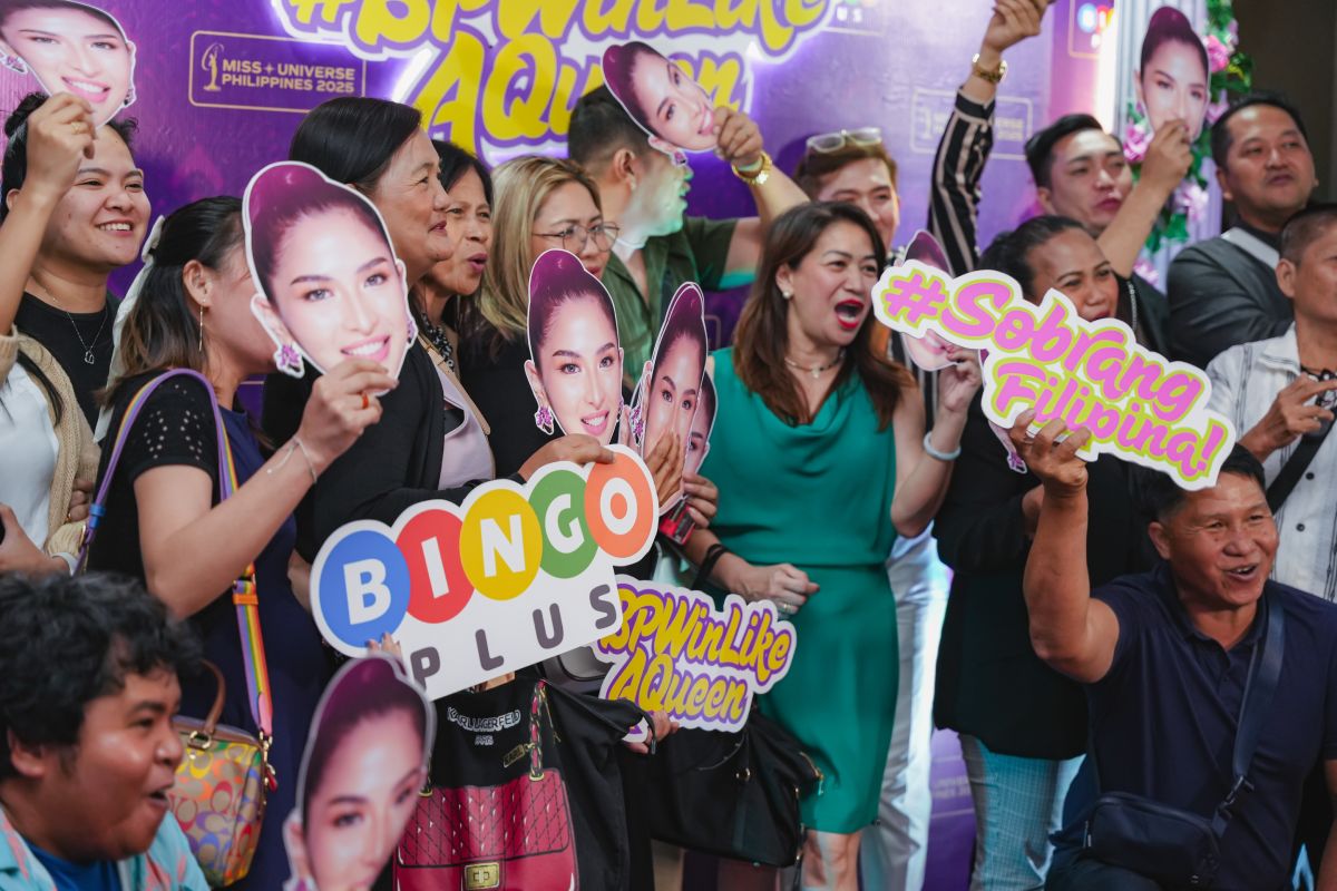 Fans cheer for their favorite representative at the Miss Universe 2025 preliminary round.