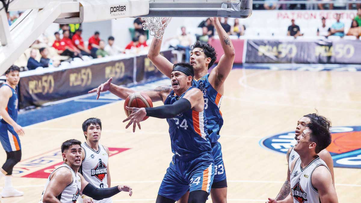 Negrense Raymar Jose loses the handle of the ball after being bumped by Meralco Bolts’ teammate Brandon Bates. (PBA photo)