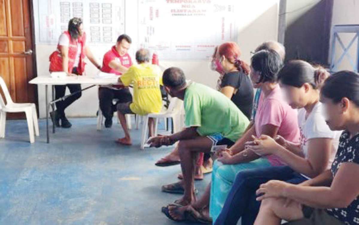 The Department of Social Welfare and Development (DSWD) distributes cash assistance to families affected by the eruption of Mt. Kanlaon in La Carlota City, Negros Occidental on Thursday, May 15, 2025. A total of 1,711 family beneficiaries received a total of P9.881 million in cash assistance under the DSWD’s Emergency Cash Transfer initiative. (DSWD-Western Visayas photo)