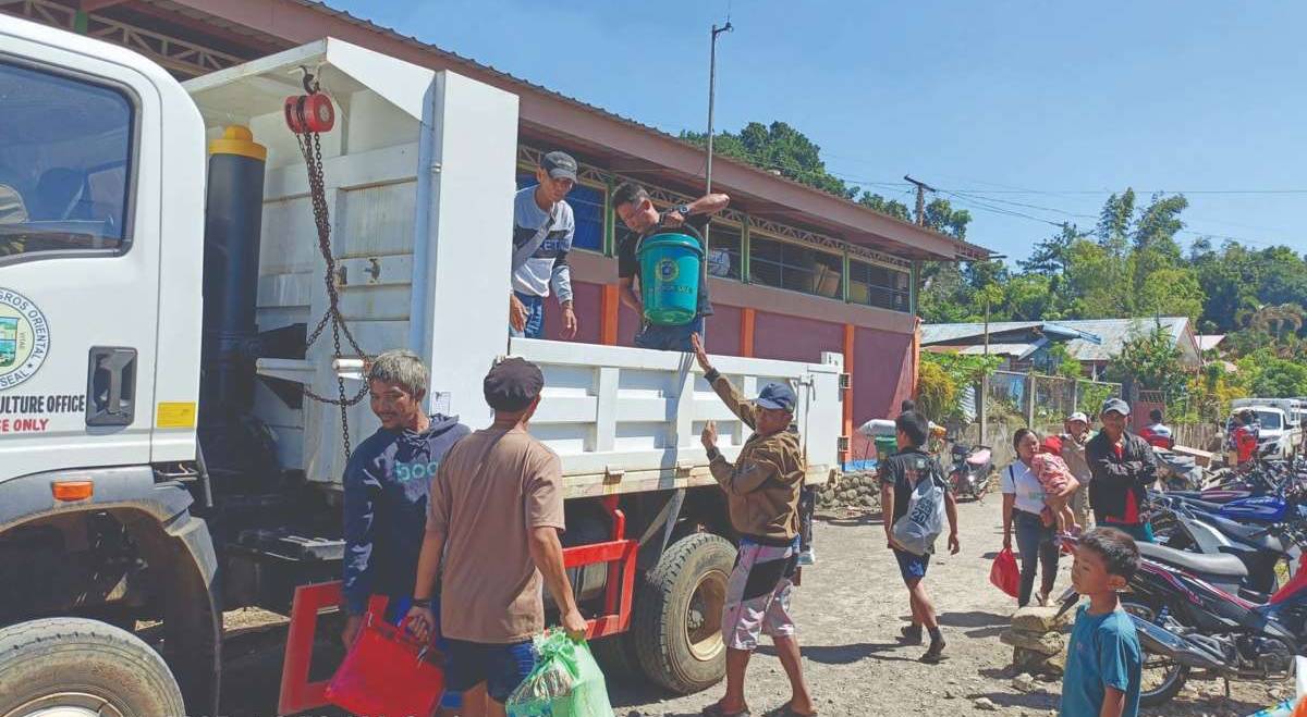 Displaced families from Barangay Masulog in Negros Oriental’s Canlaon City began returning to their homes outside Kanlaon Volcano’s four-kilometer permanent danger zone, following the volcano’s downgraded alert level. (Leah Martinez photo)  