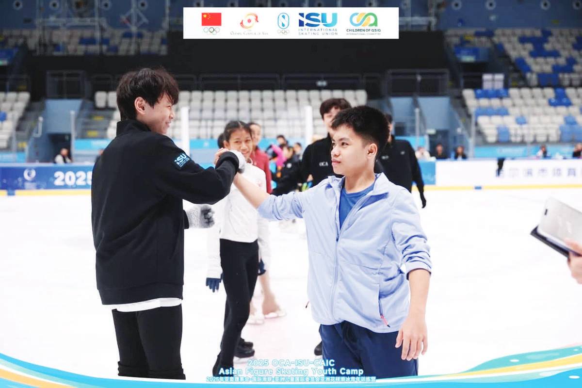 Hans Ludwig Carizo (right) during the 2025 Olympic Council of Asia - International Skating Union - Children of Asia International Committee Asian Figure Skating Youth Camp in Harbin, China on August 10, 2025. Carizo bagged the intermediate novice silver medal in the Asian Open Figure Skating Trophy at the SM Mall of Asia from August 1 to 5. (Olympic Council of Asia / Facebook photo)