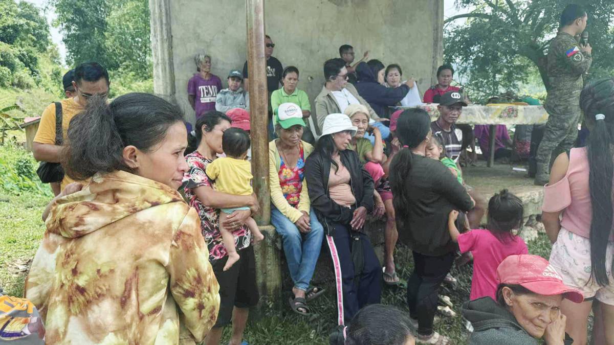 Displaced residents in Negros Occidental’s Kabankalan City remain at the evacuation center while authorities assess the security situation in the affected sitios after the encounter. (Contributed photo)