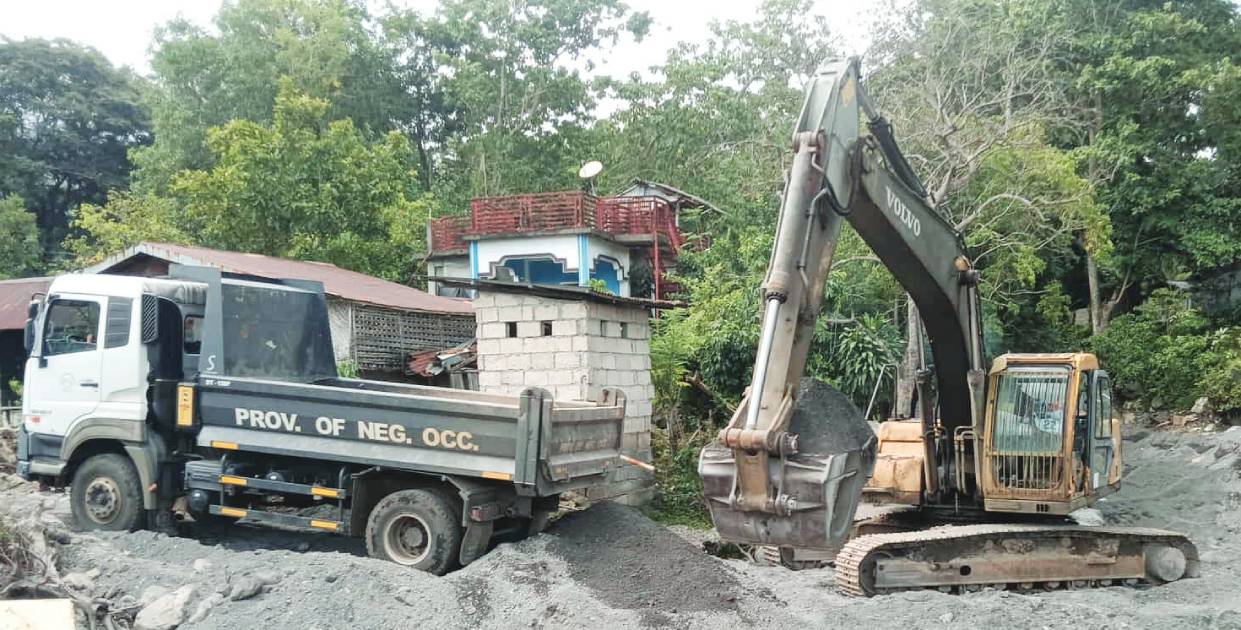 Only 808 cubic meters of volcanic sand and gravel have been removed from Tamburong Creek in Negros Occidental’s La Castellana town, a fraction of the estimated 28,000 cubic meters that must be cleared to restore the creek’s natural flow. (Remuel Lajo photo)
